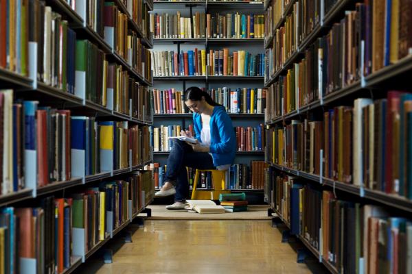Student in library.