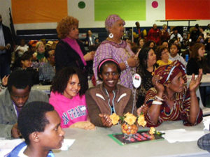 Somali youth and families celebrating at a school event